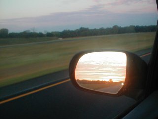 [Sunrise in the rear view mirror]